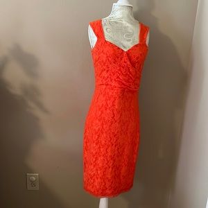 Beautiful sleeveless Sunday dress in lace, coral color.